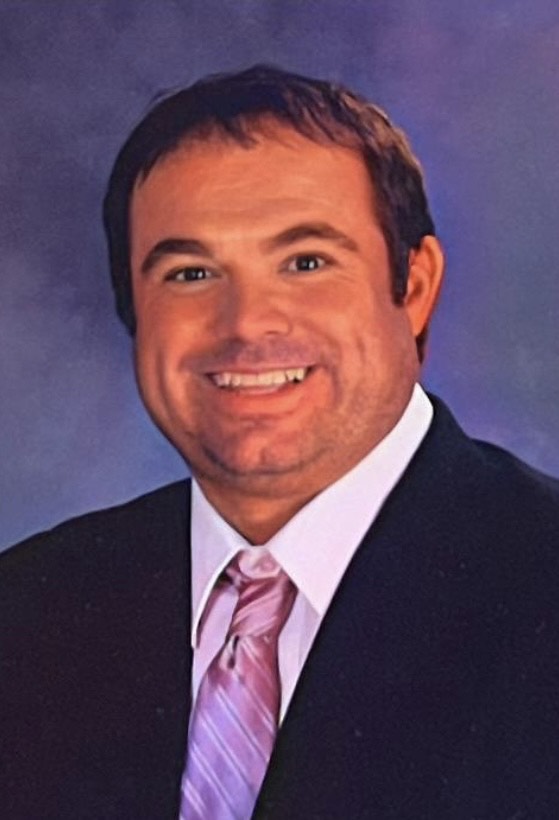 Professional headshot of Derek Cantrell